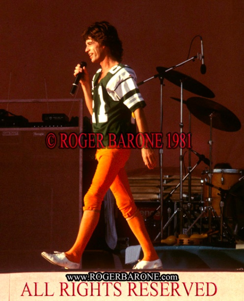 Mick Jagger wears a Philadelphia Eagles football jersey at JFK Stadium Stones show, © Roger Barone 1981